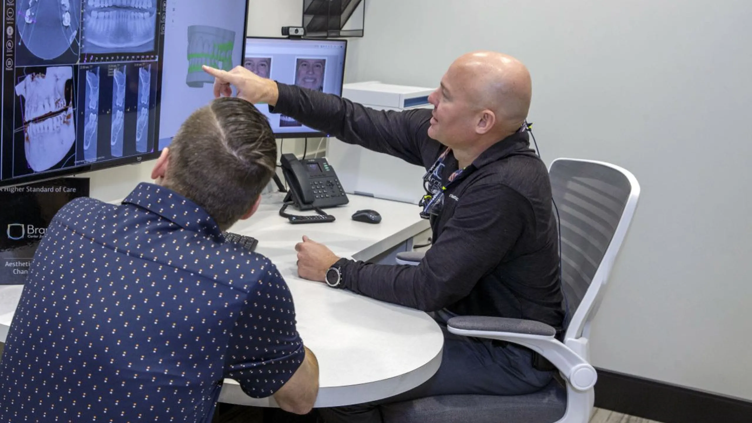 Dr. Dudley explains a procedure to a patient