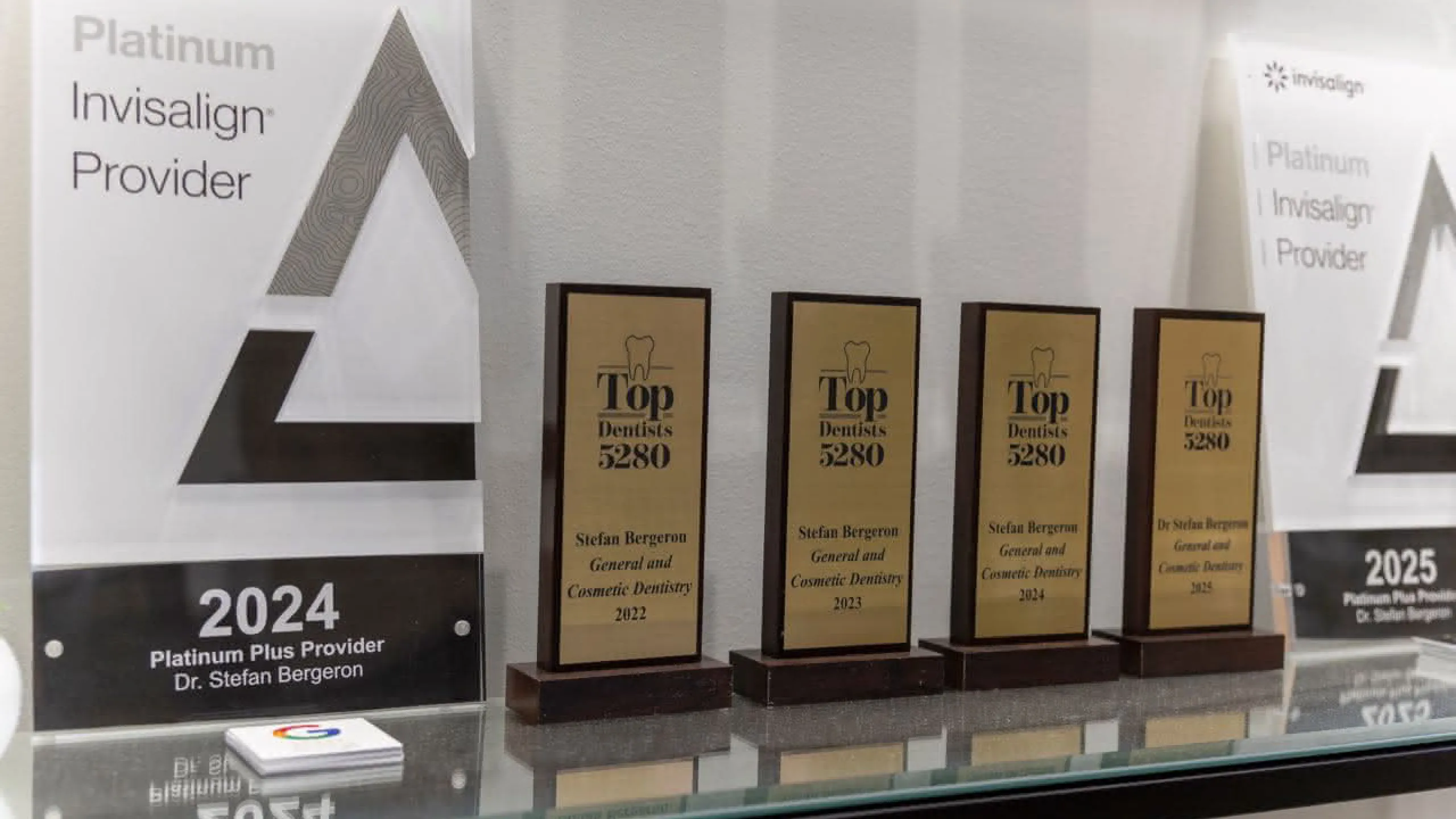 A row of awards for Golden, CO office