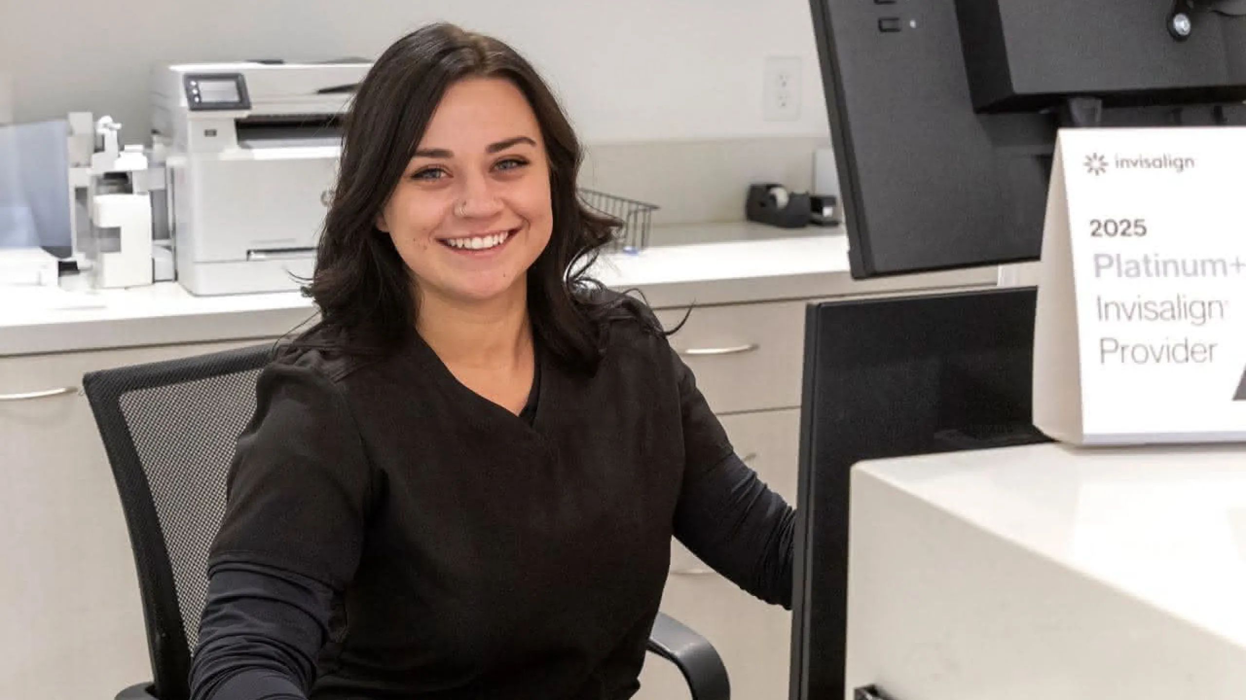 Staff member working at a computer