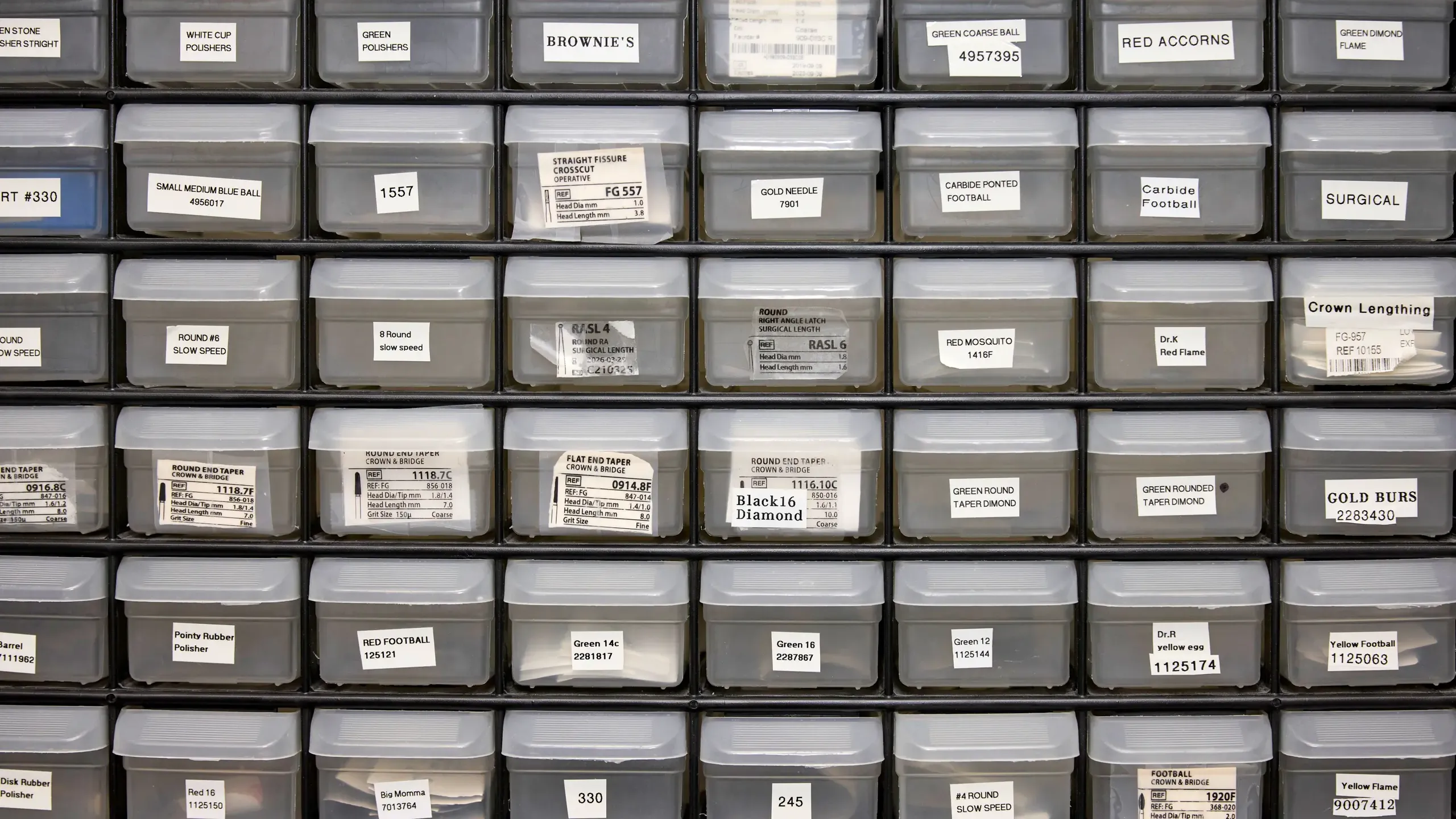 A rack of plastic boxes