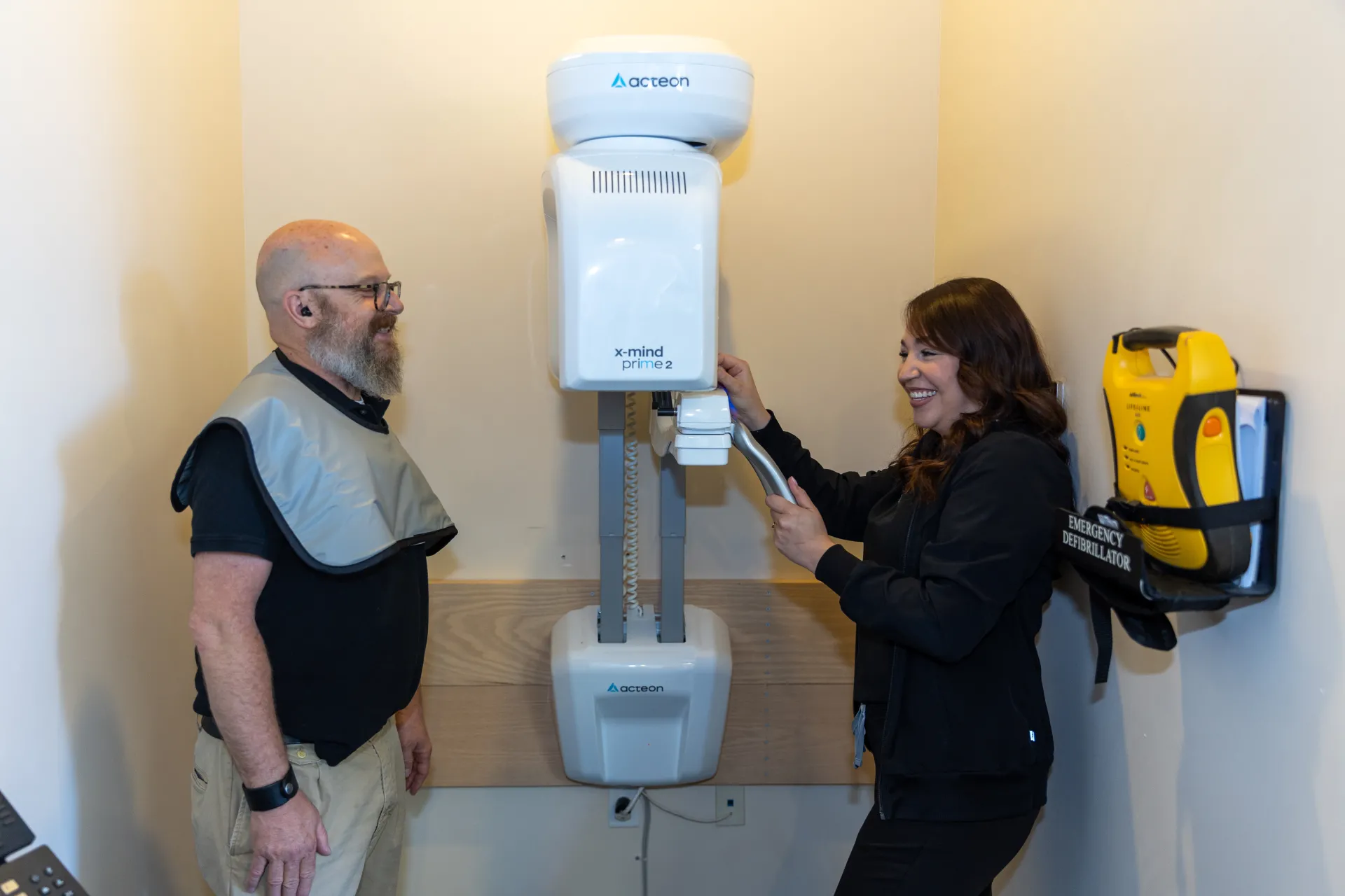 Employee helping a patient