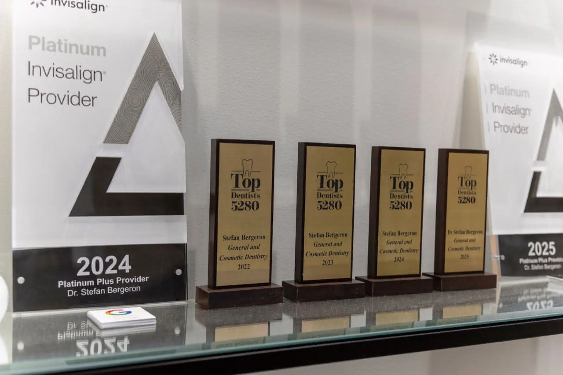 A row of awards for Golden, CO office