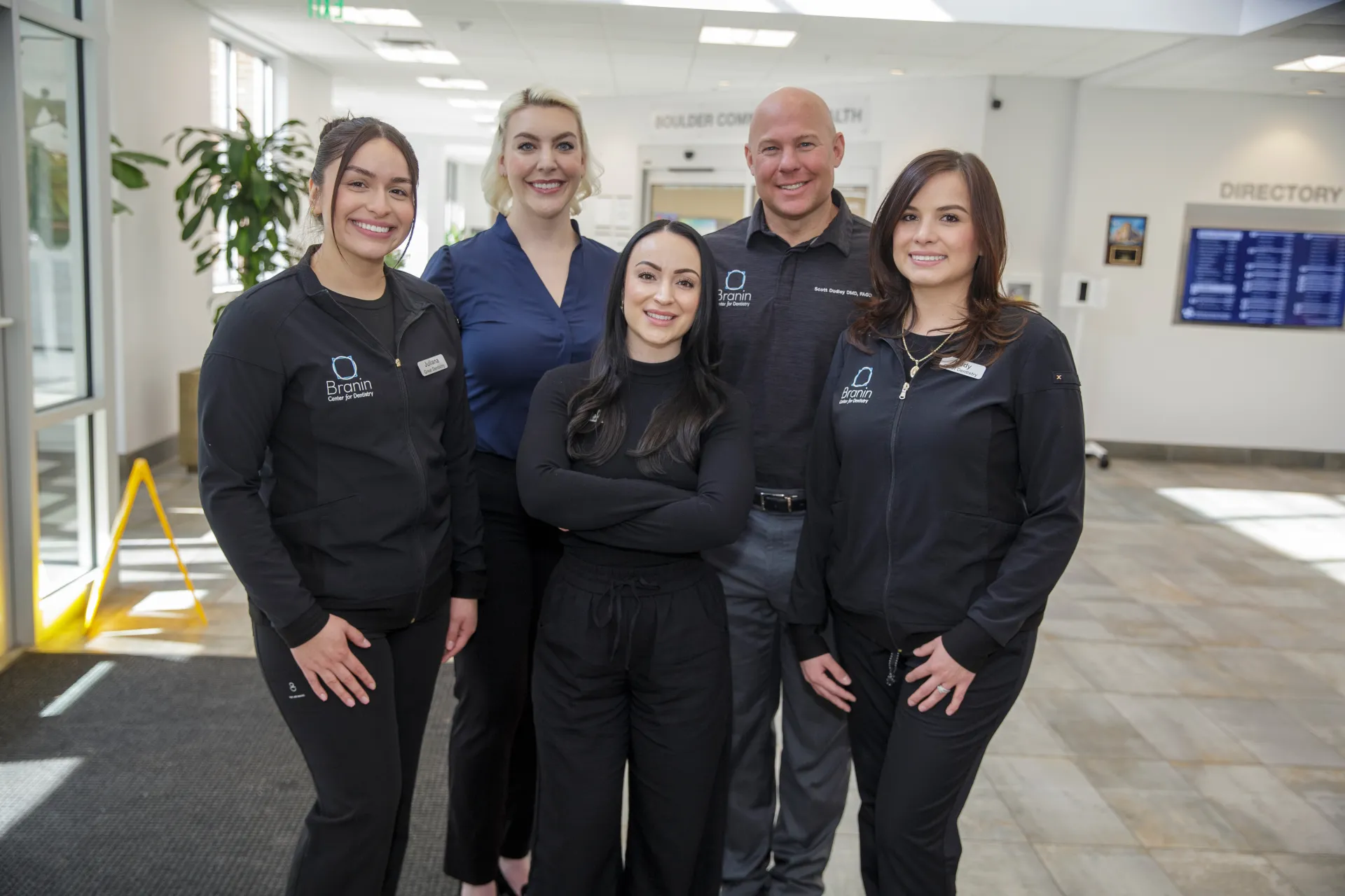 Dr. Scott Dudley and Dr. Claire Sesson smiling with Superior team