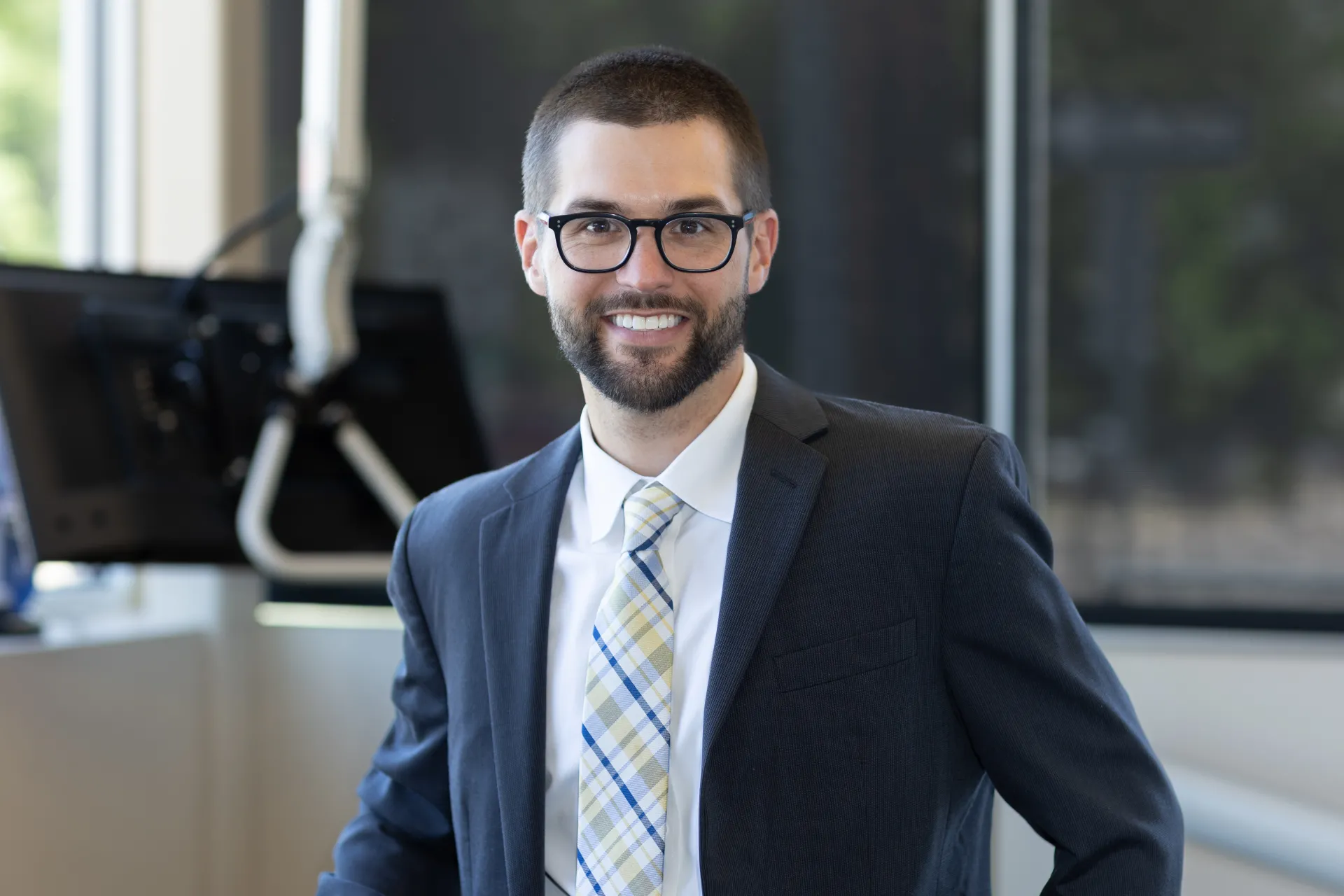 Photo of Dr. Adam Staffen smiling