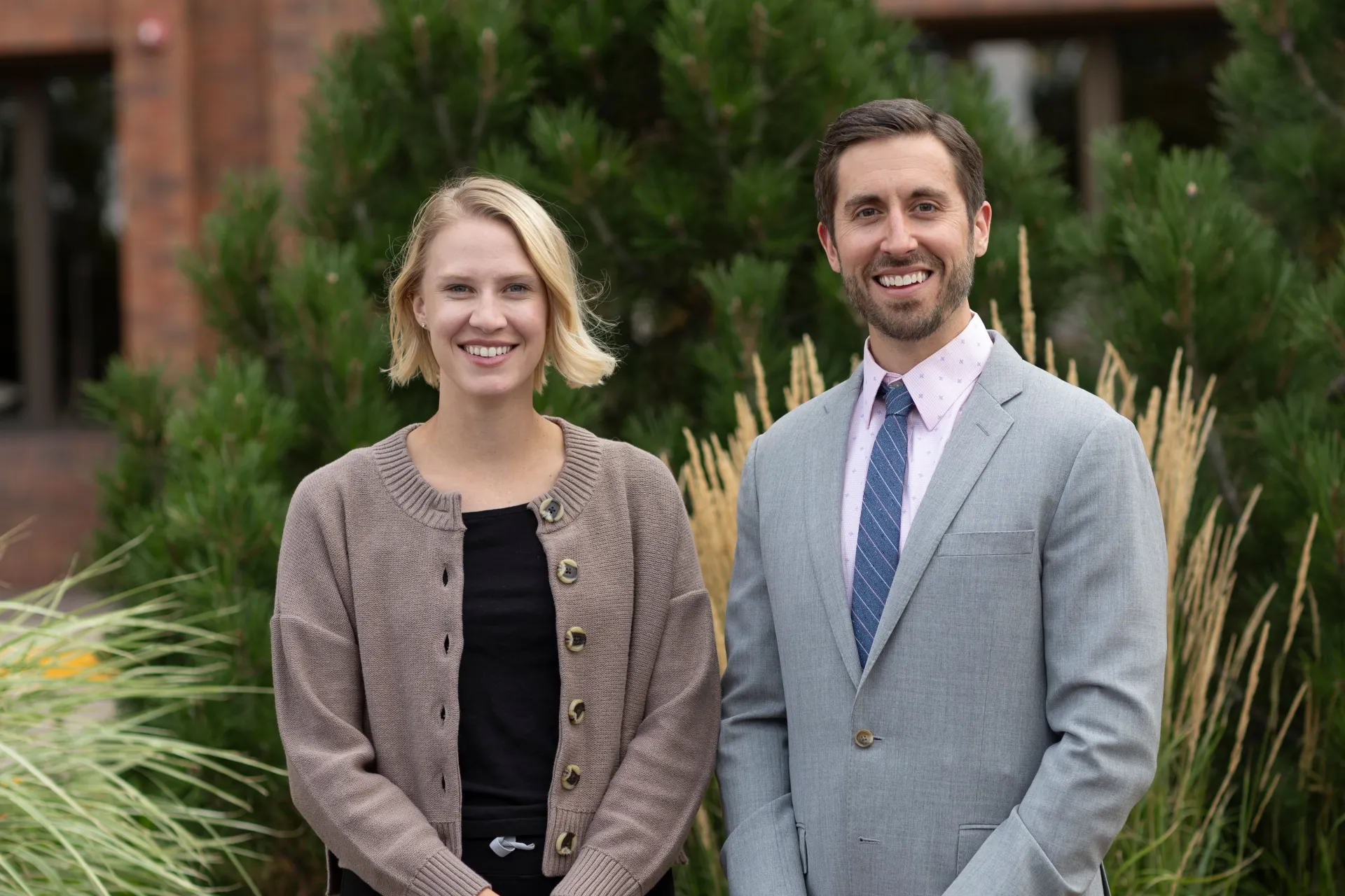 Golden dentists smiling outside 