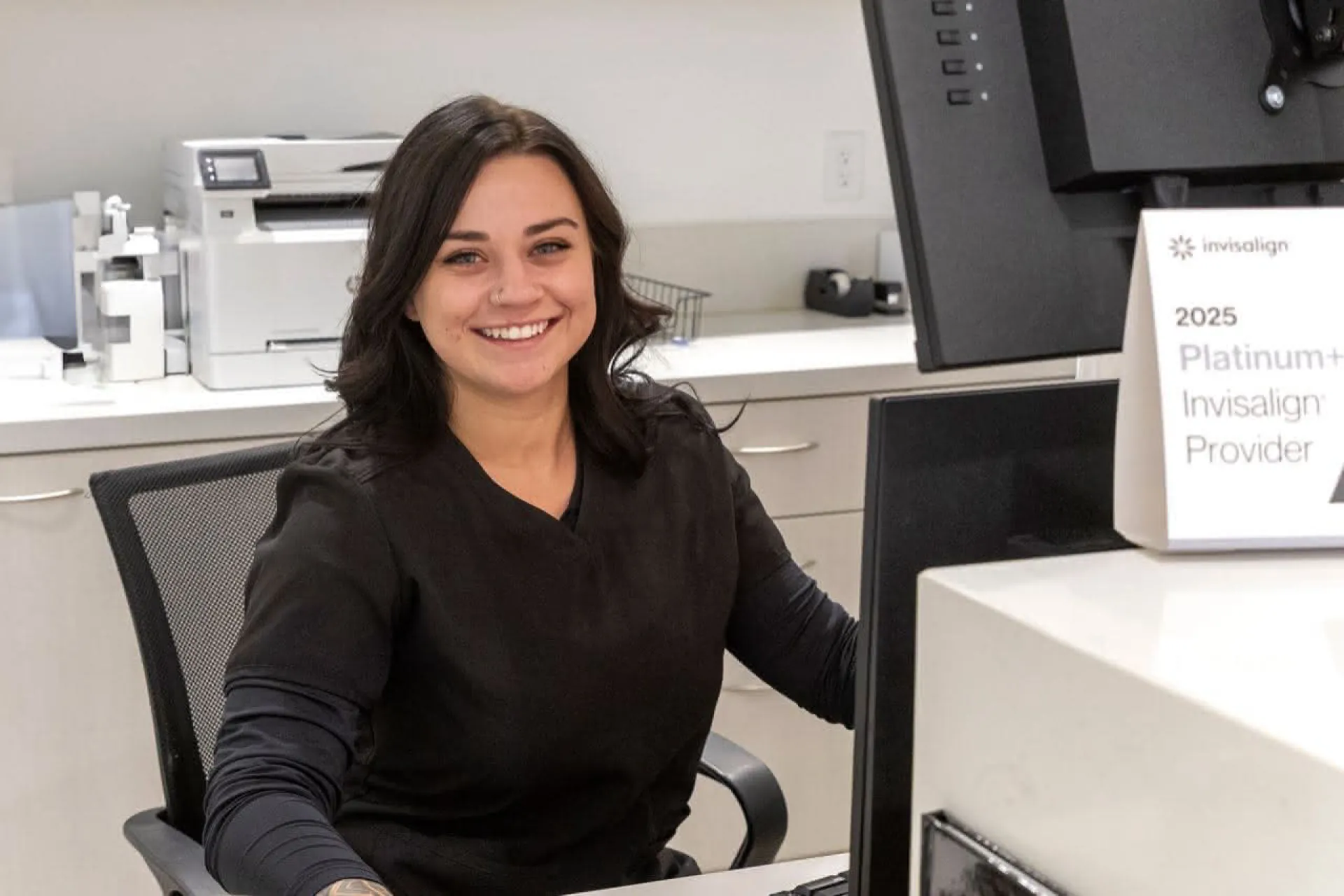 Staff member working at a computer
