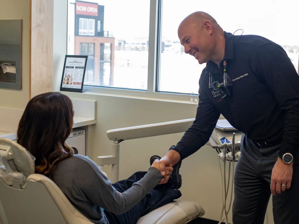 Dr. Dudley with a happy patient.