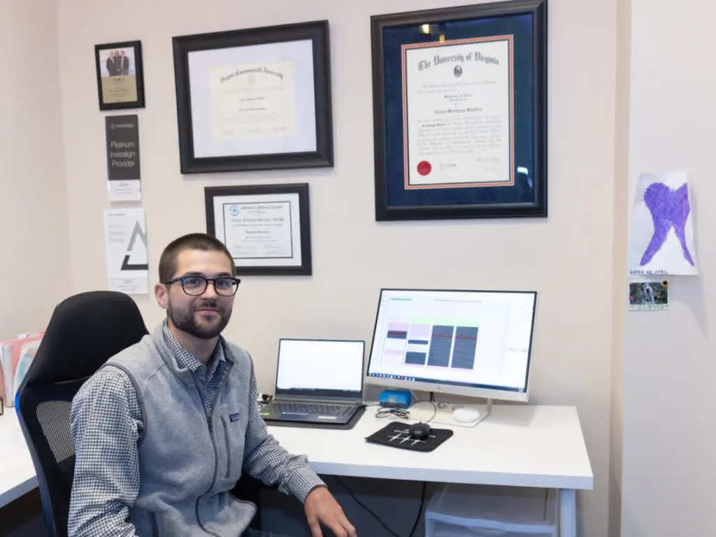Dr. Adam Staffen at his desk