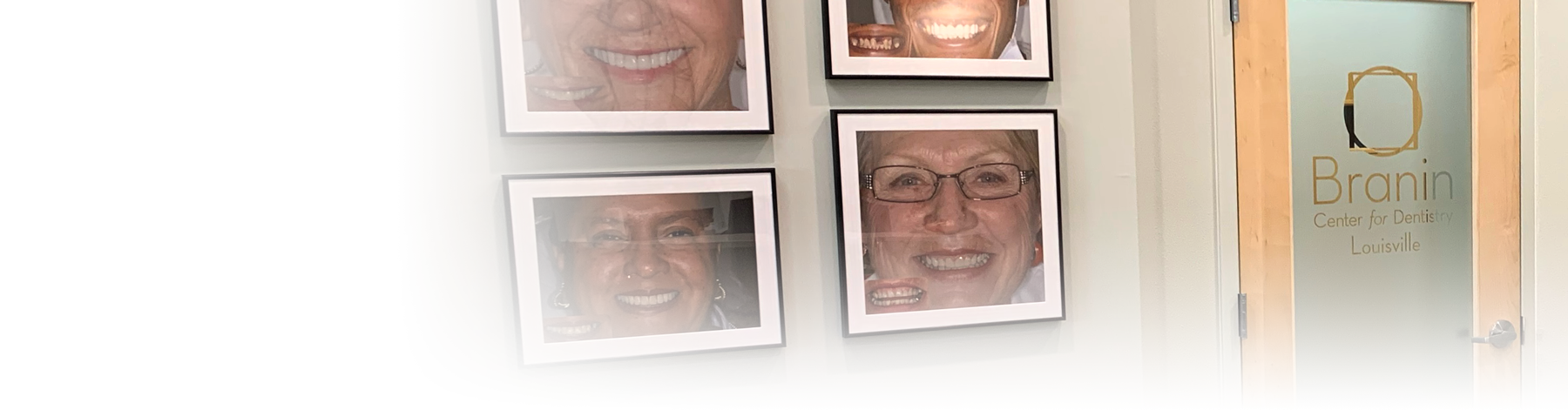 A wall full of framed photos
