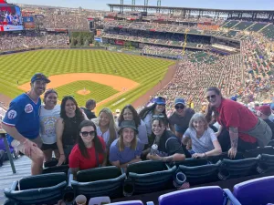 Golden team at a baseball game