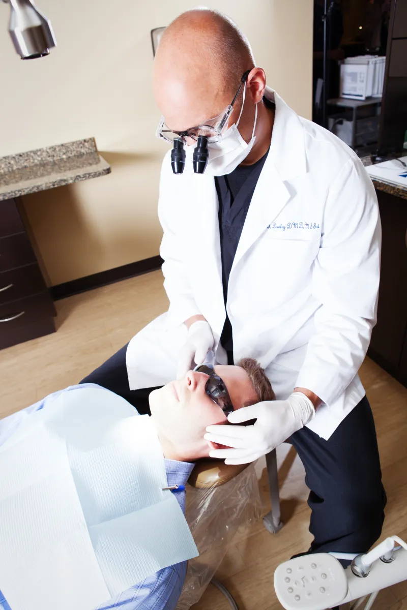 Dr. Dudley with a patient.