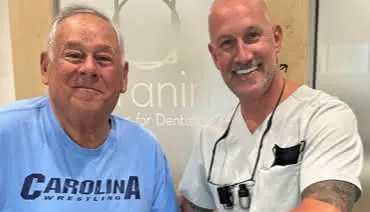 Dr Glen Fishman with a patient