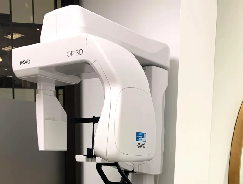 A white dental x-ray machine