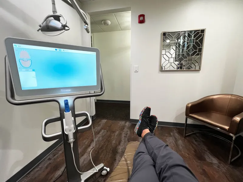 A dentist chair view of a dental exam room